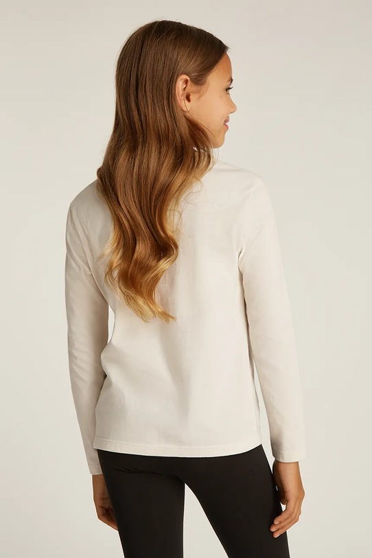 Дитячий бавовняний лонгслів Calvin Klein Jeans бежевий IG0IG02135.PPYA