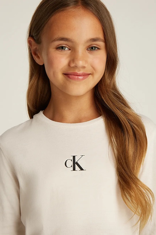 Дитячий бавовняний лонгслів Calvin Klein Jeans IG0IG02135.PPYA бежевий