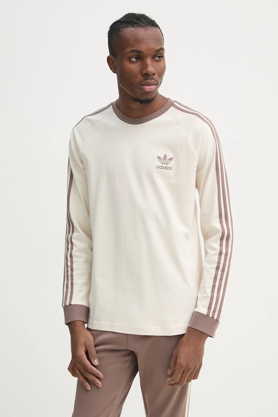 Бавовняний лонгслів adidas Originals 3-Stripes slim бежевий JN7022