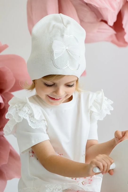 Otroška bombažna kapa Jamiks MARTINA Potisk bela MARTINA.Nak.gl.JWH060.G