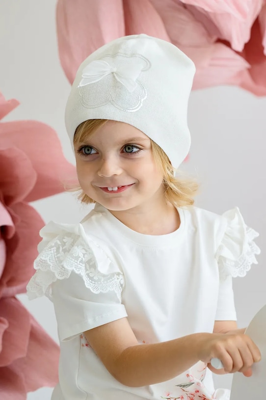 Otroška bombažna kapa Jamiks MARTINA bela MARTINA.Nak.gl.JWH060.G