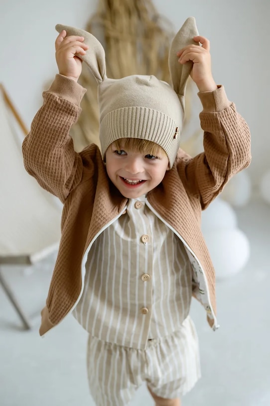 Дитяча бавовняна шапка Jamiks NORI бавовна бежевий NORI.Nakr.glow.JWH106.G