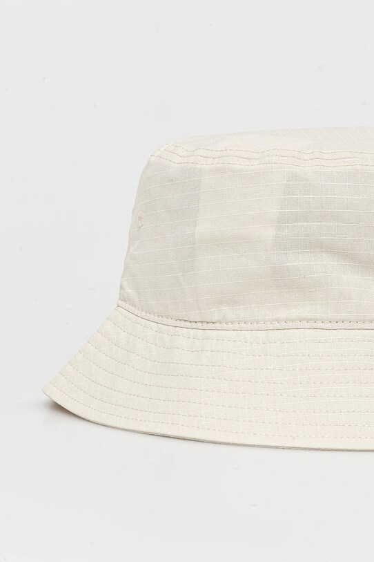 Dodaci Pamučni šešir New Balance LAH51018LIN bež