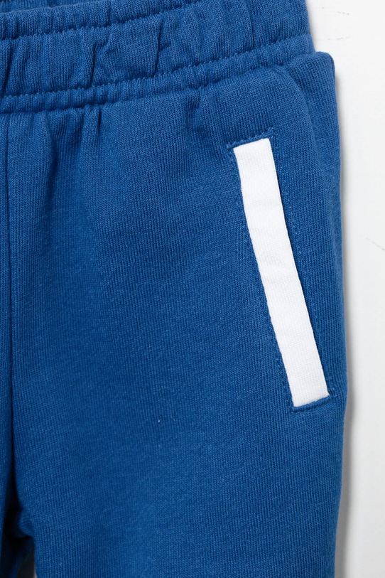 Дитячий бавовняний спортивний костюм Guess білий N5RG05.KA6R4.PPYA