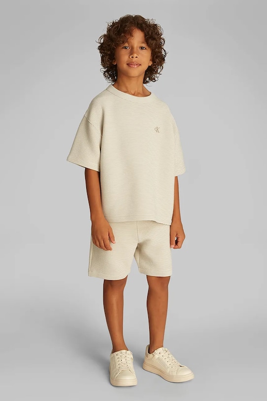 Дитячий комплект Calvin Klein Jeans з еластаном бежевий IB0IB02503.128.176.PPYA