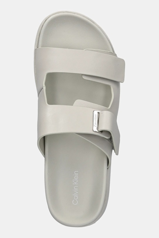 Шкіряні шльопанці Calvin Klein FLAT ADJ SLIDE EYELET бежевий HW0HW02489