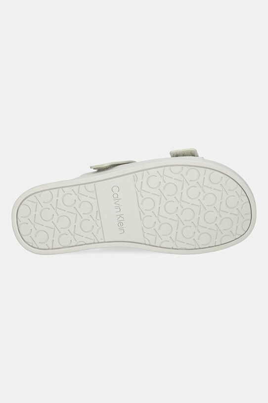 Calvin Klein klapki skórzane FLAT ADJ SLIDE EYELET HW0HW02489 beżowy