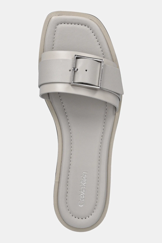 Calvin Klein klapki skórzane FLAT SLIDE W/BUCKLE - LTH beżowy HW0HW02490