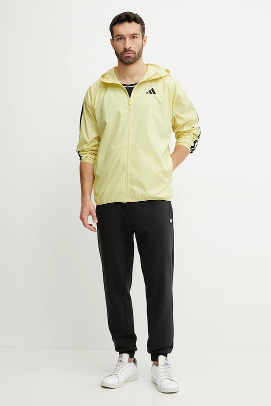 Bunda adidas Essentials IM7847 žlutá SS25