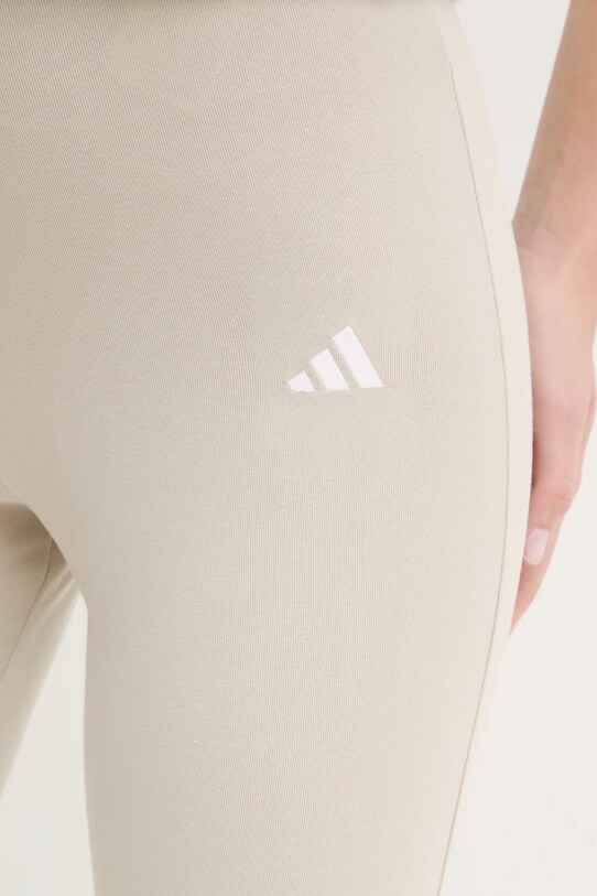 adidas legginsy Essentials beżowy JD3072