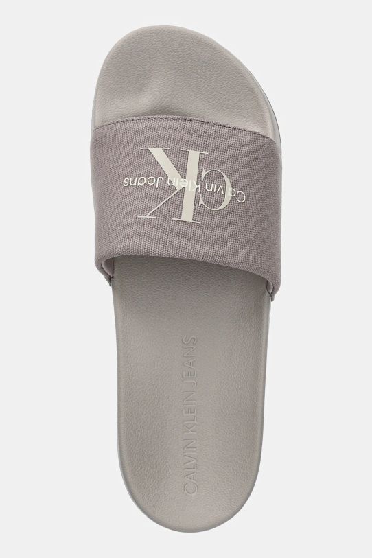 Calvin Klein Jeans klapki SLIDE MONOGRAM beżowy YM0YM01271