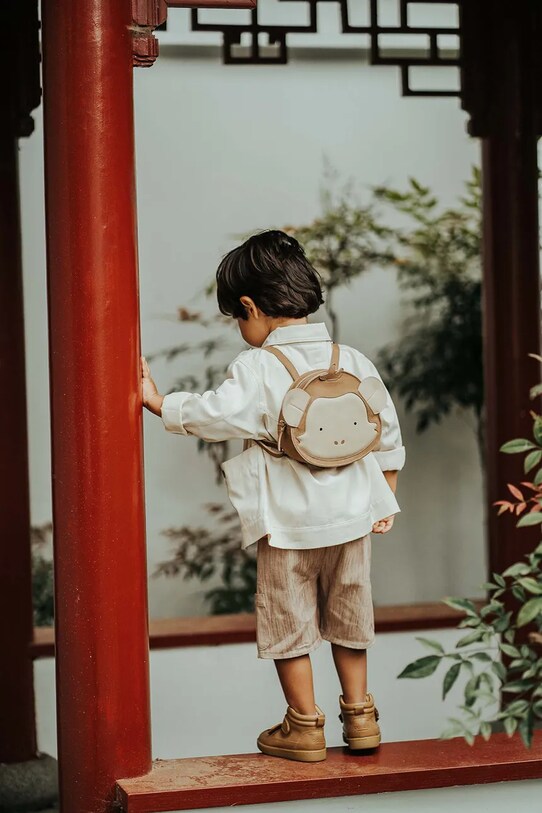 Dětský kožený batoh Donsje Kapi Special Backpack Monkey 5005221 hnědá