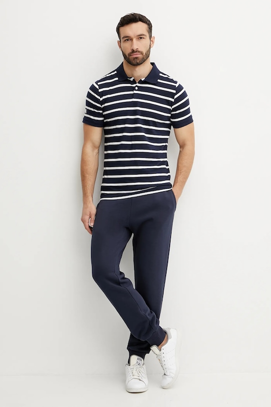 Хлопковое поло Helly Hansen NEWPORT POLO 34412 тёмно-синий SS25