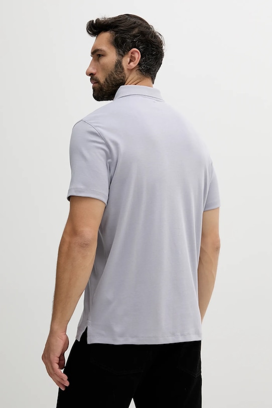 Bombažen polo Calvin Klein LV04LB276G vijolična AW25