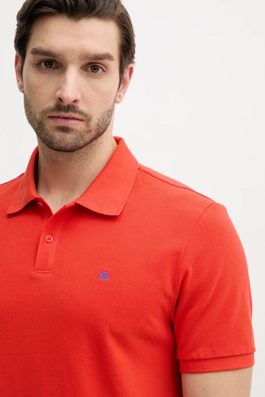 Bombažen polo Calvin Klein Jeans oranžna LV040EM269