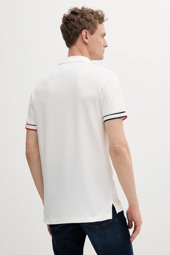 Bavlněné polo tričko Tommy Jeans DM0DM21306 bílá SS25