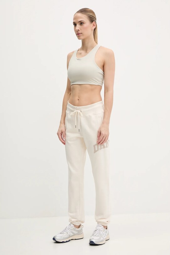 Bavlnené tepláky Dkny DP5P3615. béžová SS25