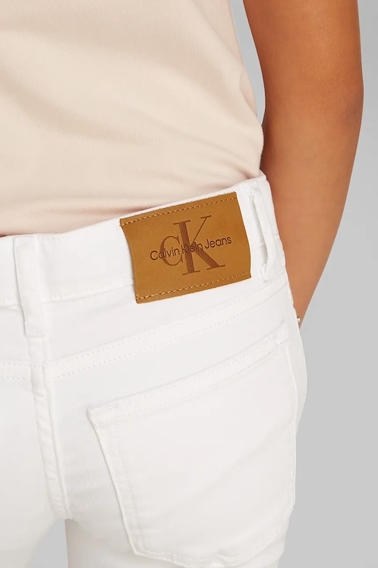 Dětské rifle Calvin Klein Jeans FLARE IG0IG02840.PPYA bílá