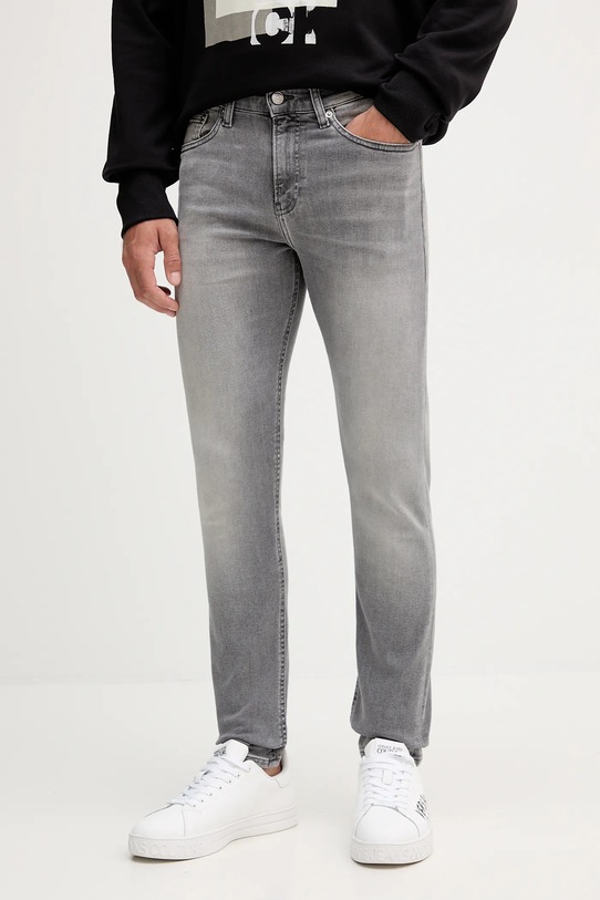 Rifle Calvin Klein Jeans sivá J30J326562