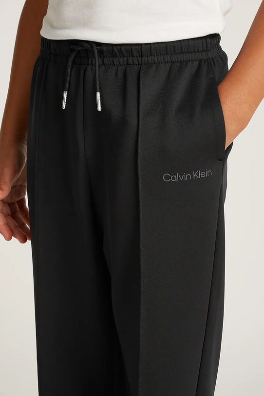 Detské tepláky Calvin Klein Jeans STRAIGHT LEG IB0IB02347.PPYA čierna