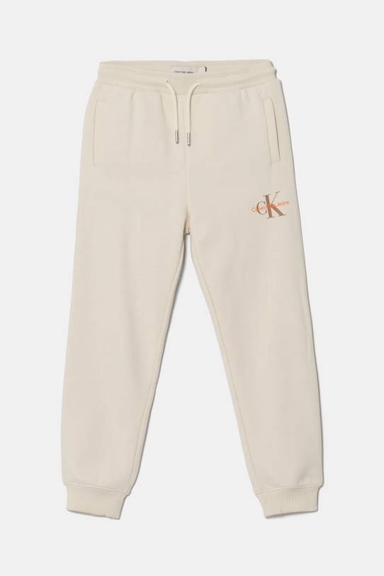 Calvin Klein Jeans spodnie dresowe bawełniane dziecięce bawełna beżowy IU0IU00285.PPYA
