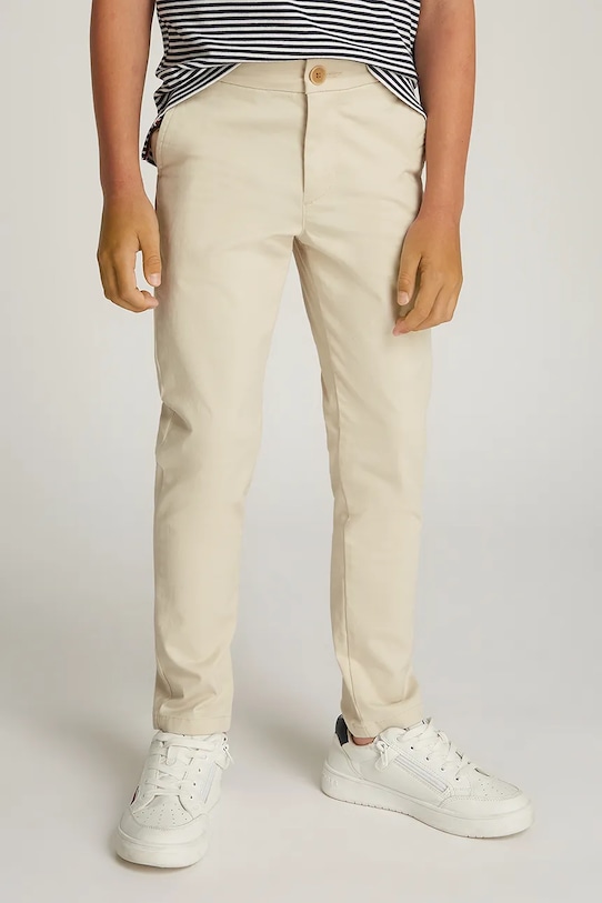 Dětské kalhoty Tommy Hilfiger látka béžová KB0KB09435.128.176.PPYA