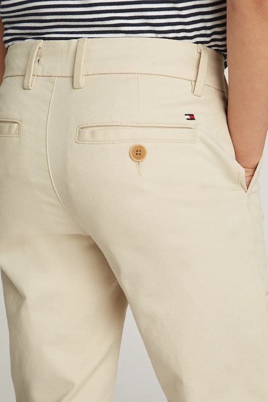 Dětské kalhoty Tommy Hilfiger KB0KB09435.128.176.PPYA béžová