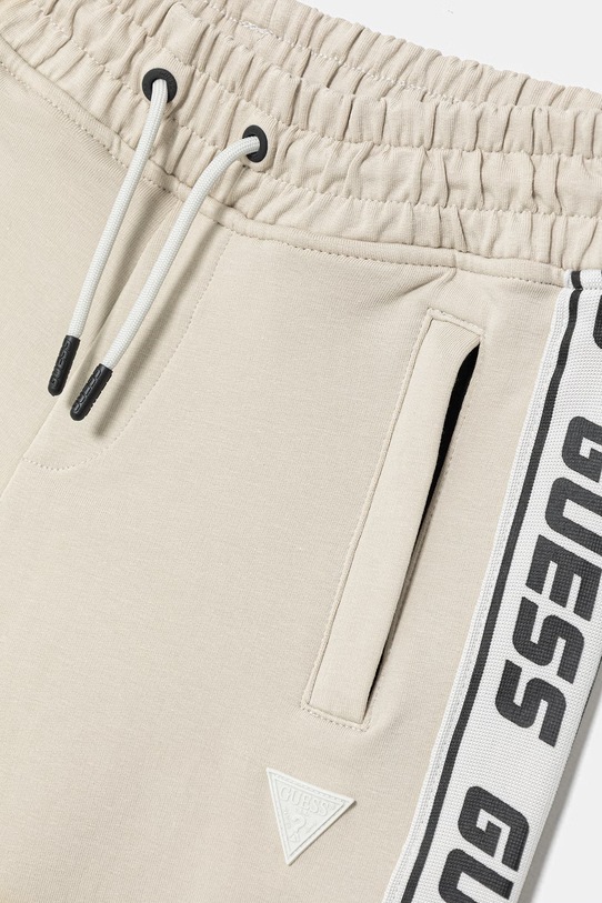 Chłopiec Guess spodnie dresowe dziecięce L2YQ48.K6ZS1.PPYA beżowy