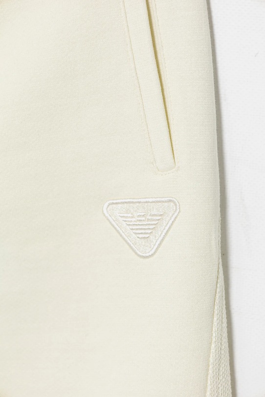 Otroški spodnji del trenirke Emporio Armani bež EB000354.AF13455