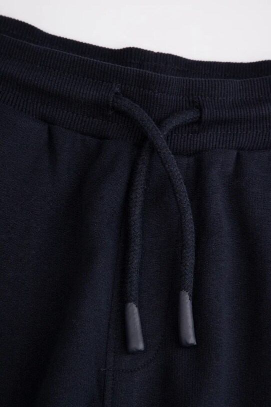 Dječaci Dječji pamučni donji dio trenirke Coccodrillo WC5120101VBA mornarsko plava