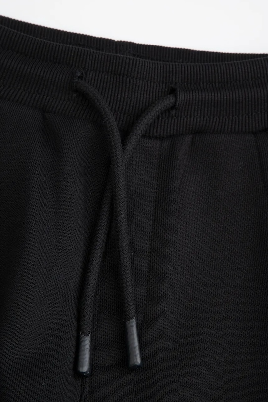 Dječaci Dječji pamučni donji dio trenirke Coccodrillo WC5120101VBA crna