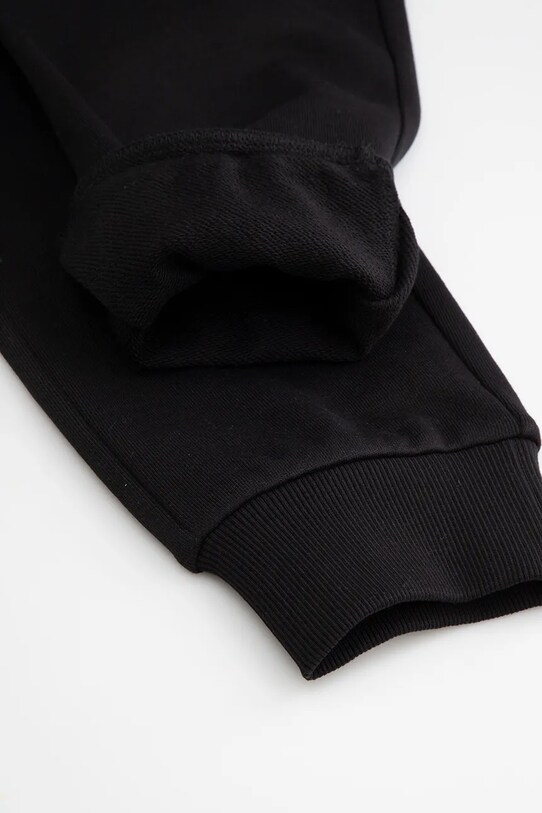 Coccodrillo pantaloni de trening din bumbac pentru copii negru WC5120101VBA
