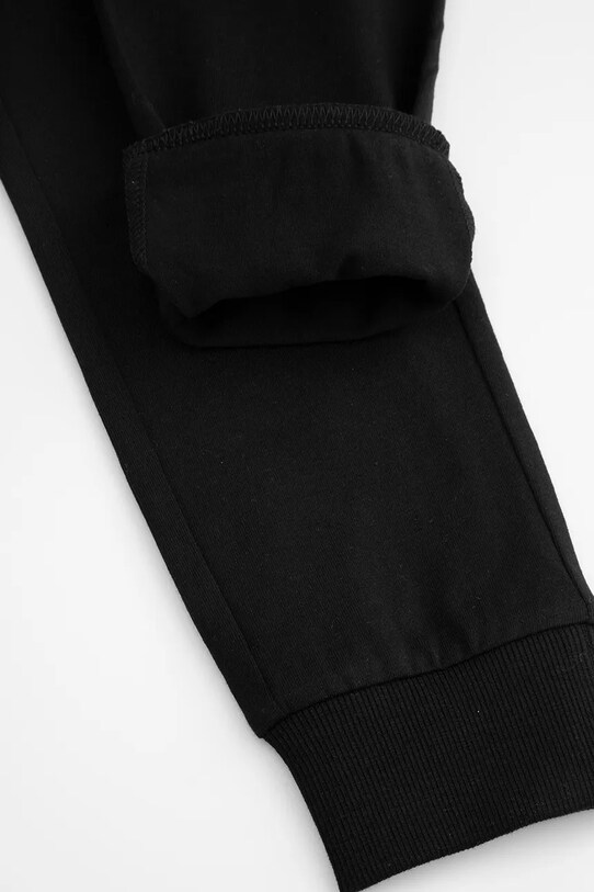 Dječji donji dio trenirke Coccodrillo crna WC5122101VBA