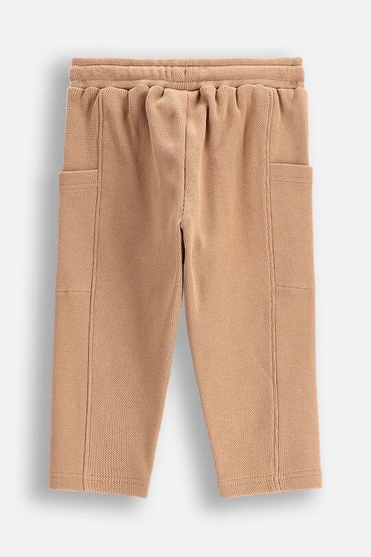 Otroška bombažna trenirka Coccodrillo WC5120101MBN bež SS25