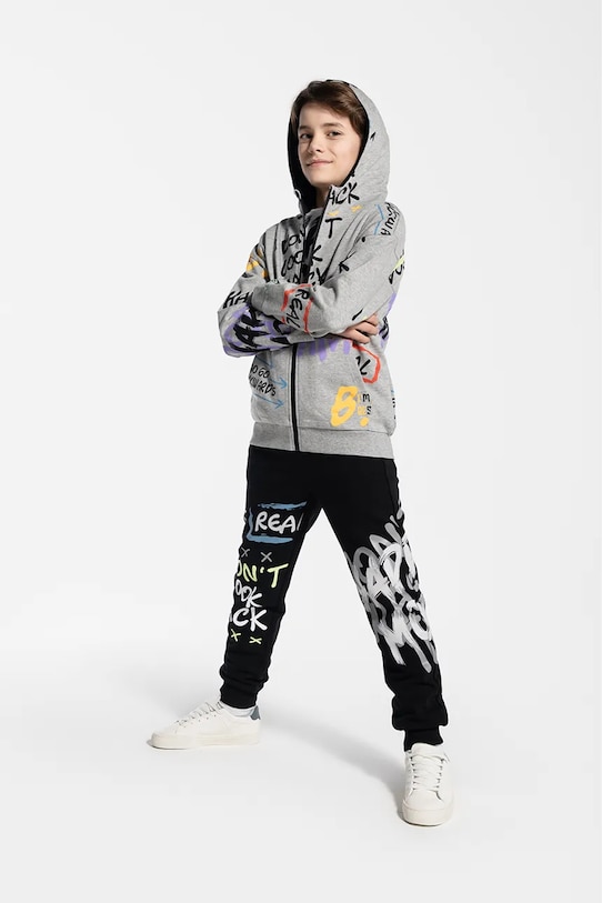 Detské tepláky Coccodrillo pletenina čierna WC5120102SBJ