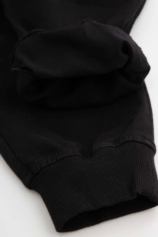 Detské tepláky Coccodrillo čierna WC5119102CBJ