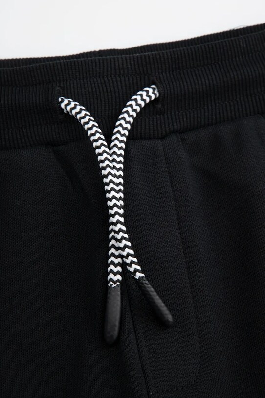 Dječji pamučni donji dio trenirke Coccodrillo crna WC5120101DBJ