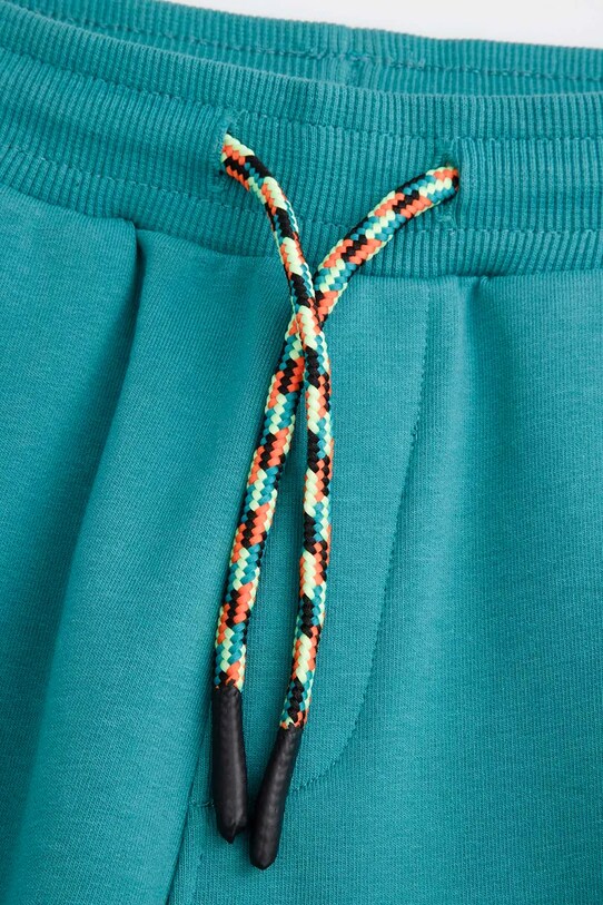 Băieți Coccodrillo pantaloni de trening pentru copii WC5122701DBK turcoaz