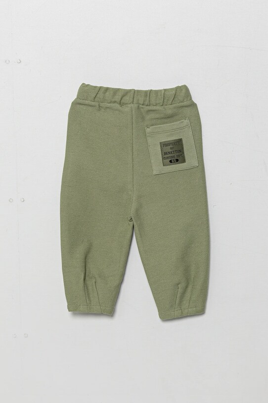 Dětské bavlněné tepláky United Colors of Benetton 3HJMGF04M.P.Seasonal zelená SS25