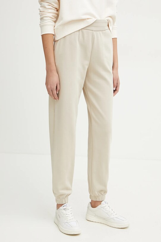 Tepláky Armani Exchange pletenina béžová XW000089.AF10172