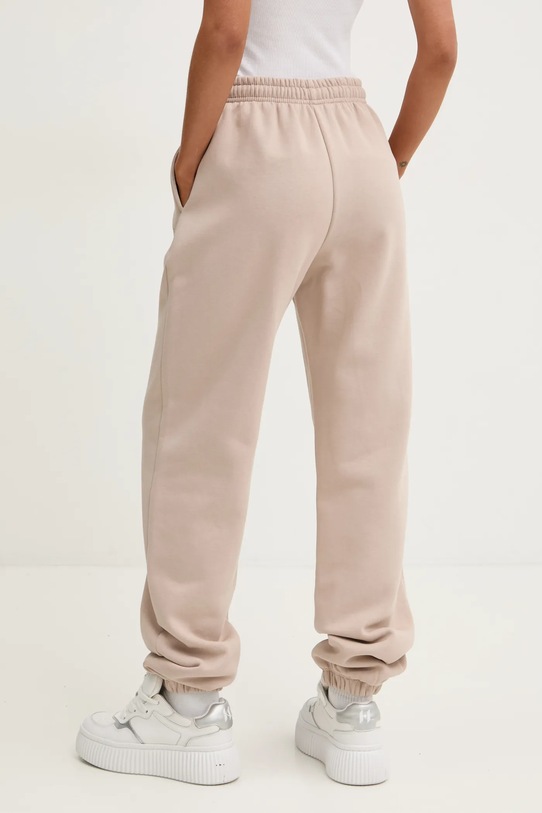 Rotate pantaloni de trening din bumbac 1134242313 bej SS25