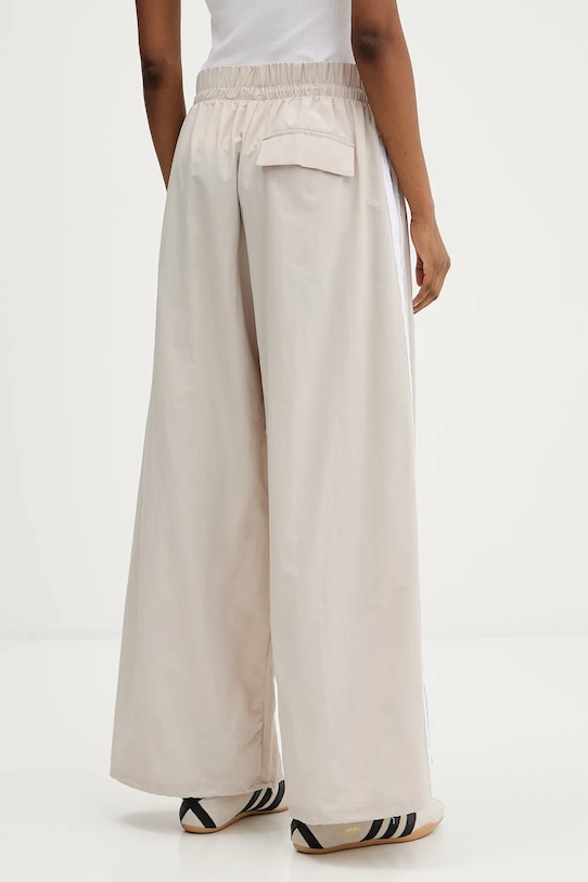 Odzież adidas spodnie dresowe Essentials JC8168 beżowy