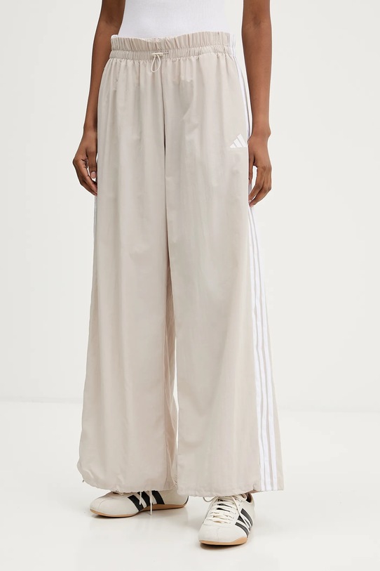 adidas spodnie dresowe Essentials beżowy JC8168