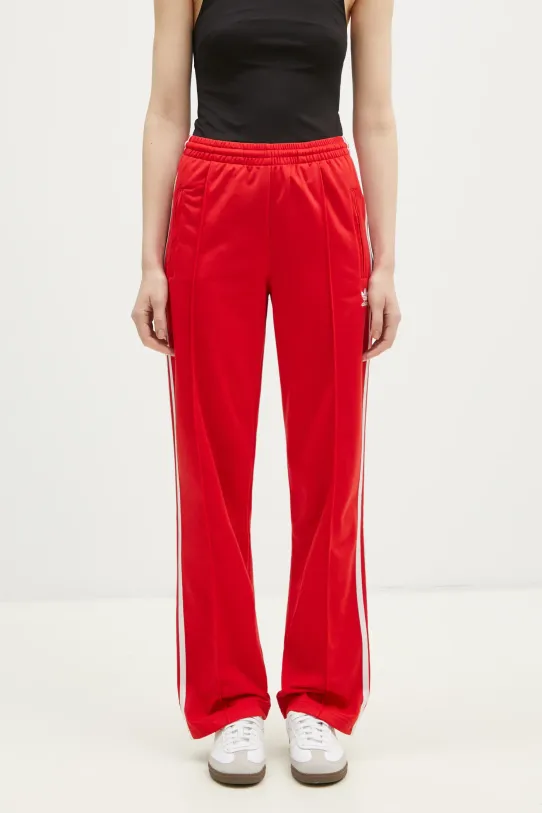 Donji dio trenirke adidas Originals Firebird natpis crvena IR8081