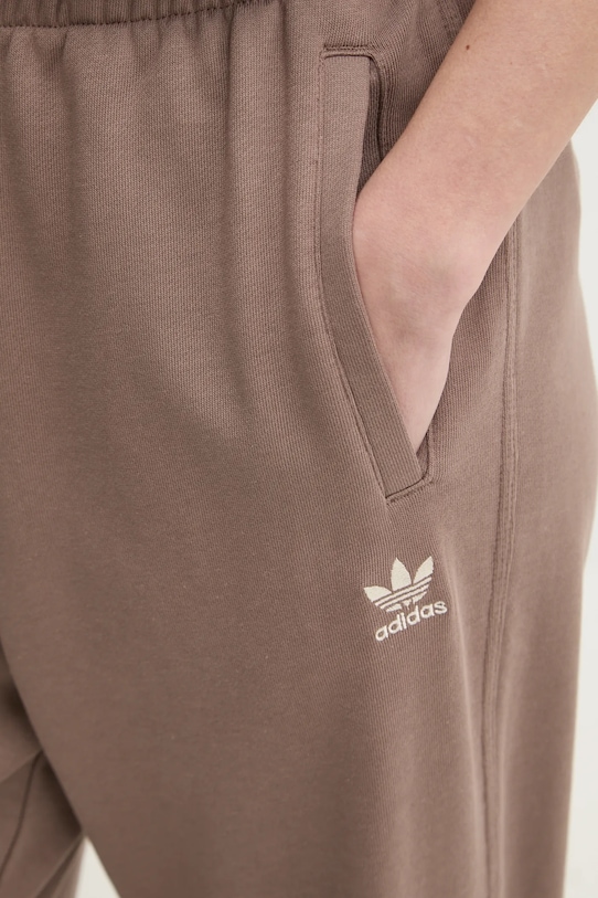 Bavlněné tepláky adidas Originals Essential JD1523 hnědá