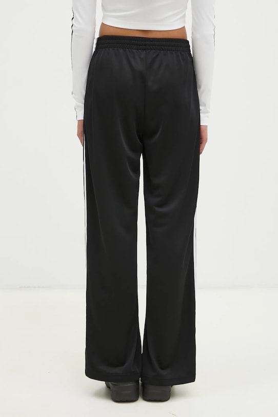 Odzież adidas Originals spodnie dresowe Firebird JC8245 czarny