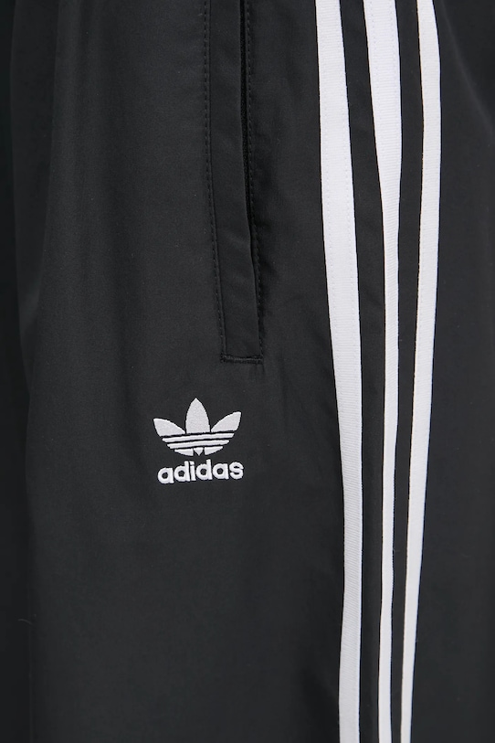 Tepláky adidas Originals OVERSIZED TP černá JD3390