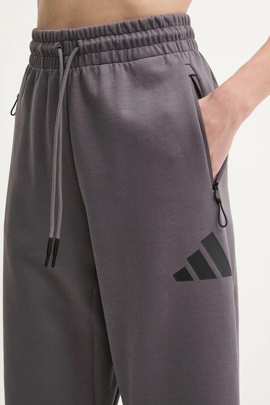 Спортивные штаны adidas Z.N.E. фиолетовой JC5411