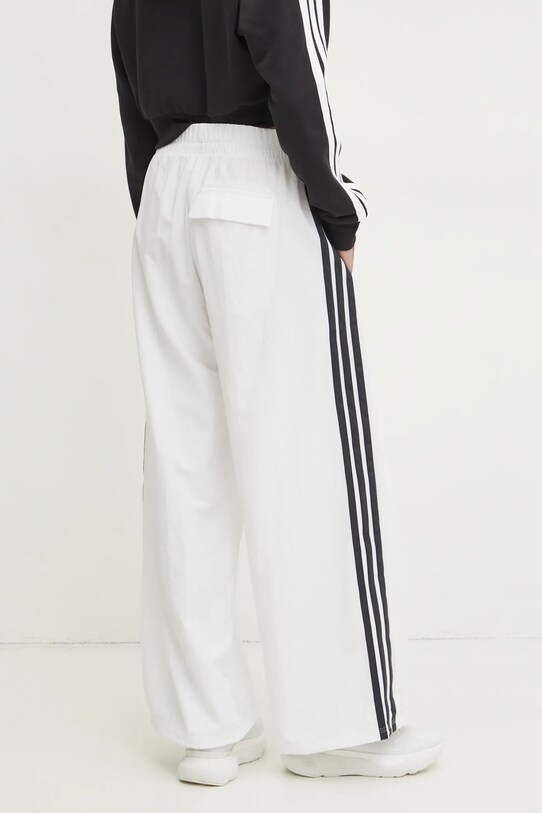 Одяг Спортивні штани adidas Essentials JE1307 бежевий