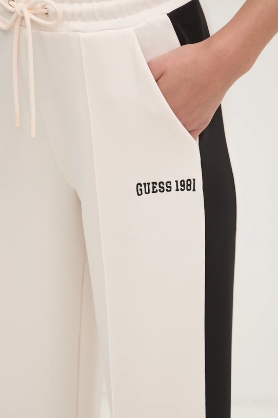 Tepláky Guess SUZANNE béžová V5RB00.KCO72